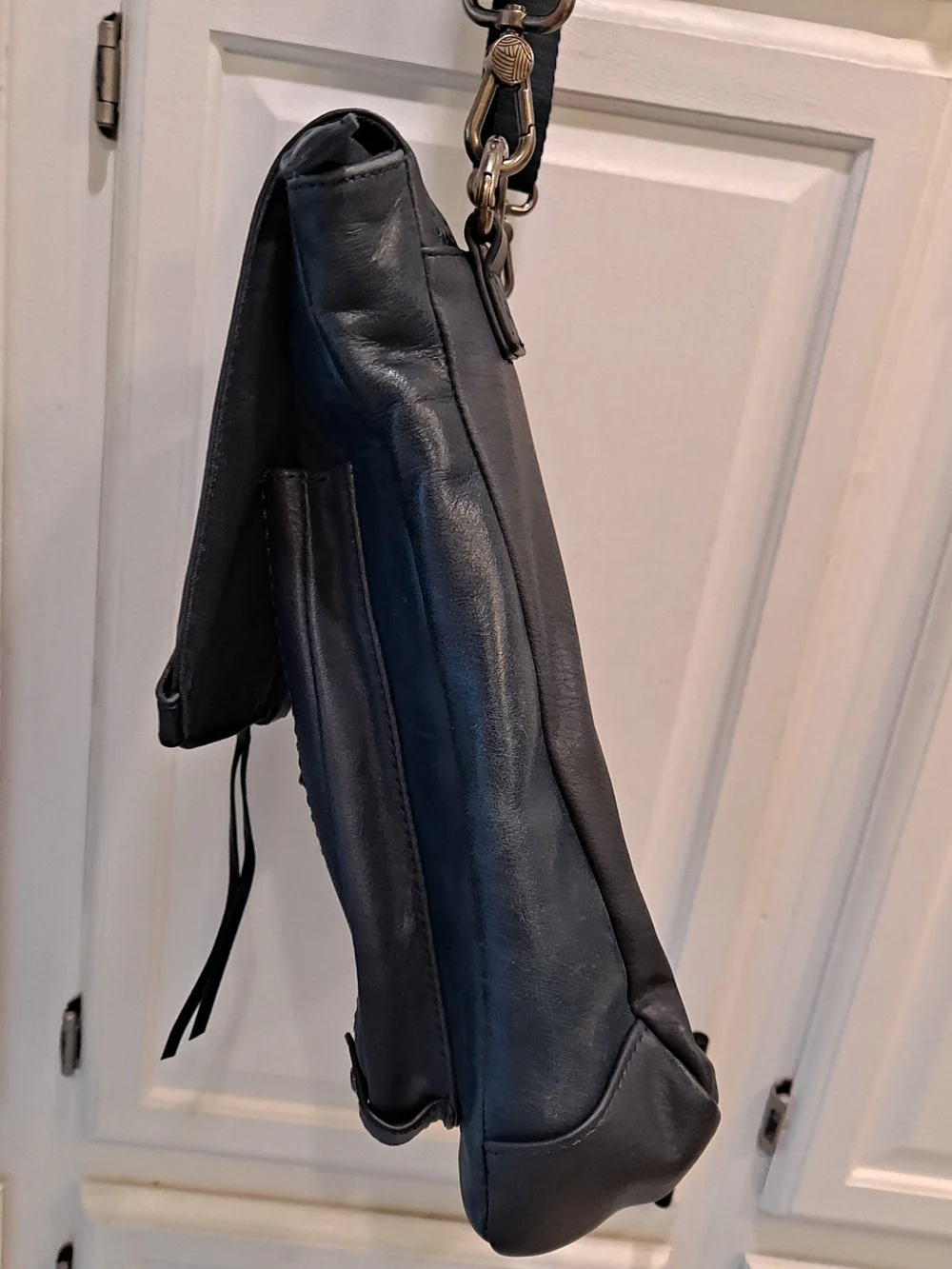The Sak Ventura II Convertible Backpack Indigo Blue Leather Floral Embossed Bag